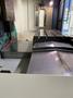 2014 DOOSAN MYNX 5400 with Chip Conveyor Vertical Machining Center