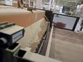 100 TON ATOM S 6110 / 2 L EV DIE CUTTING PRESS W/ UNWIND STATION. STOCK # 0772526