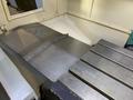 2014 DOOSAN MYNX 5400 with Chip Conveyor Vertical Machining Center
