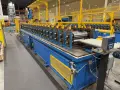 22 STAND X 2" RLM (NEW 2004) ROLLFORMER LINE TOOLED FOR TERMINATOR GUTTER TOPPER, 26" ROLL SPACE STOCK# 4413