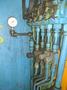 20,000 LBS BRANER HYDRAULIC COIL UPENDER WITH POWER FEED CONVEYOR: YOBRO #25238