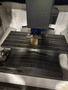 Okuma Genos M560-V VMC, 2021 – 15k Spindle, Chip Conveyor