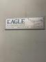2005 Eagle automated saw and knockout system s/n 05027 with enclosure with light curtain, 2005 Fanuc robot model M-900iA 350 s/n r05743652 with Fanuc system R-J3iB controls s/n e05608535, with saw grips, Eagle enclosure with core knockout system, Allen Bradley plc with panelview 700, core butt discharge conveyor with drive, gate and riser dropoff, related conveyors
