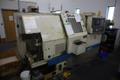 Okuma LB15 II CNC Lathe Turning Center, OSP700L CNC, 12 Station Turret, Tailstock, 8&quot; Chuck, Chip Conveyor- Auction Item
