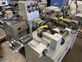 NILSON 751 FOUR SLIDE MACHINE - REBUILT / DUAL SLIDE - COINING