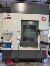 Haas UMC-750 5-Axis VMC, 2022 – 30” Travels, 15K Spindle, 50+1 Tools, TSC &amp; Chip Conveyor (1)