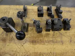 Aloris BXA Quick Change Tool Post with Assorted Slide-On Cutter Holders, 3" x 3" Base- Auction Item