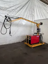 LINCOLN IDEALARC PULSE POWER 500 WELDER W/ BOOM AND LINCOLN LN-9F WIRE FEEDER. STOCK #0627922.