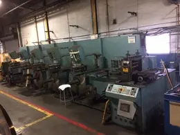 12"  FERRARA SLITTING LINE WITH 5 HEAD TRAVERSE WINDER