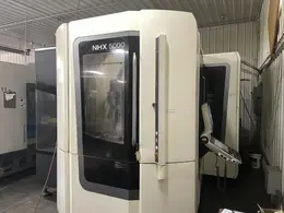 DMG Mori NHX5000 CNC Horizontal Machining Center with Pallet Changer, High Pressure Thru-Spindle Coolant, 60 Station Tool Changer, 50 HP High Torque 15,000 RPM Spindle