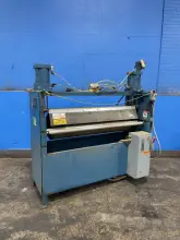 THE UNION TOOL CORP 56” X 2” ROLLERS HYDRAULIC SHEETER   -  UNION ROTARY PRESS #15, 50