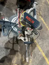 12" BOSCH MODEL #5412 SLIDING MITER SAW: STOCK #22476