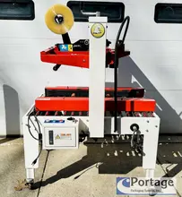 Eagle T100 Carton Sealer  |  Side Driven Belts  |  Top and Bottom 3” Tape Heads  |  Adjustable Carton Sealer