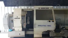 37.4″ x 156″ Hankook Protec 9NC 10″ Spindle Bore, Dual Chucks, 2006 – Chip Conveyor, 8 Station Turret