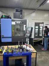 Doosan DVF 5000 5-Axis CNC VMC, 18000 RPM, x-24", y-17", z-15", 120 ATC, 40 Taper, 12 Pallets, 30HP, (2022)