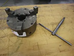 Buck 8.25" 3-Jaw Chuck, D1-4" Camlock Back, 2" Hole, Chuck Wrench- Auction Item