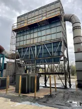 Top access pulse bag dust collector with screw discharge, 300 hp motor and New York blower model 49rts s/n j00641-100, ratd at approx. 60,000 cfm