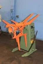 1,200 CWPMOTORIZED PAYOF/UNCOILER MODEL 1200-18M (14056)