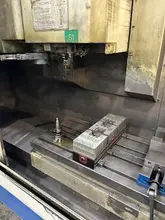 Okuma MC-V4020 VMC, 2005 – Chip Conveyor, 15,000 RPM 32 Slot Tool Changer