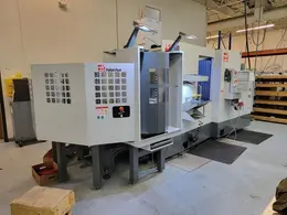 Haas EC-400 Pallet Pool 4-Axis CNC Horizontal Machining Center with 6-Station Pallet Pool, 12,000 RPM Spindle, Full 4th Axis, 100 Station Tool Changer, 1000 PSI Through Spindle Coolant, and Probing.