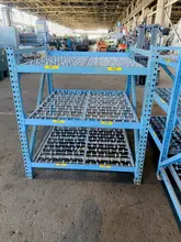 3 TIER 48" X 52" GRAVITY ROLLING RACK. STOCK # 0312121