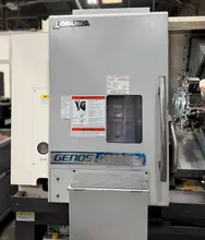 Okuma Genos L-300-MYW-e , 10″ 3-Jaw Kitagawa Chuck Main Spindle, 6″ 3-Jaw Kitagawa Chuck Sub Spindle, Y Axis, 12-Station Live Tool Turret, Tool Presetter, Parts Catcher, Chip Conveyor