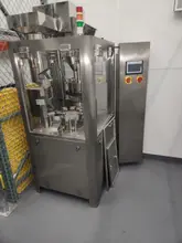 APM-USA Encapsulation Line, 2020 – Filler, Counter, Capper, Labeler, Sleeve Shrink, Sealer, Conveyors