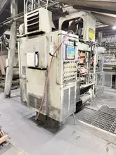 Hunter model hmp 10C automatic molding machine s/n 82P928, op. with Emerson PLC, feed belt