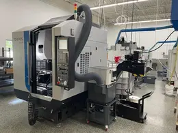 Tornos Almac CU 2007 7-Axis CNC Vertical Machining Center with Part Loading and Parts Catcher System, Probing, 20K Spindle, Lehman 2-Axis Rotary Table, Back Operation Tilting Rotary Vise