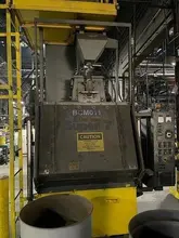 2012 
DeLong 7 super rubber belt tumblast machine rated at 7 cu ft capacity, 20hp direct drive shot wheel, very good condition