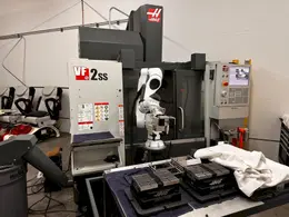 2024 HAAS VF-2SS with HC10 6-Axis Cobot with low hours. Vertical Machining Center