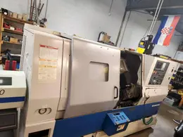 Doosan Puma 240B CNC Lathe, 2005 – Bar Feeder, Tailstock, Parts Catcher