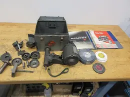 Dumore Tool Post Grinder Series 44, In Metal Case with Grinding Wheels and Accessories- Auction Item