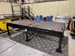 1 - PREOWNED 5' X 10' ACORN WELDING TABLE