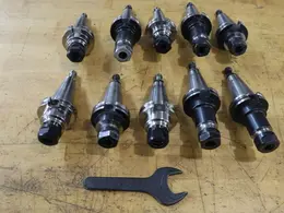 CT40 Taper Tool Holders: (10) ER-20 Collet Holders, (1) Wrench- Auction Item