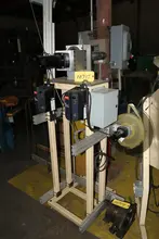 2 SPINDLE MOTORIZED TAPE UNCOILER REEL: STOCK 10715