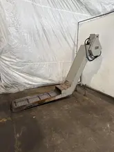 48" LONG X 12" WIDE HENNIG KM0-0320-00 CHIP CONVEYOR. STOCK #1000225