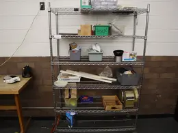 Rolling Wire Racking Unit with 6 Adjustable Shelves and Assorted Contents- Auction Item