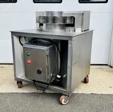 Urschel Laboratories Inc.  |  10 Station Semi-Automatic Rotating Onion Slicer