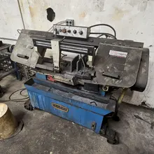 9" X 16" BAILEGH BS-916M HORIZONTAL BANDSAW. STOCK # 0560825.
