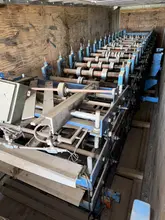 44" DUAL HEIGHT ASC R &amp; AG PANEL ROLLFORMER LINE. STOCK # 0133725