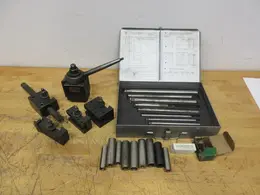Aloris CXA Tool Post and (4) Assorted Holders, with Everede Tool Co. Boring Bar Set with Sleeves and Cutting Inserts- Auction Item
