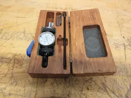 Blake Mfg. Coaxial Indicator .0005" Increments, .125" Travel Range, 1-3/8" Face with Stylus Points in Wood Case- Auction Item