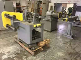 12" x 2 1/2" RUESCH MODEL 76 SLITTING LINE WITH DUAL
WINDERS (13035)