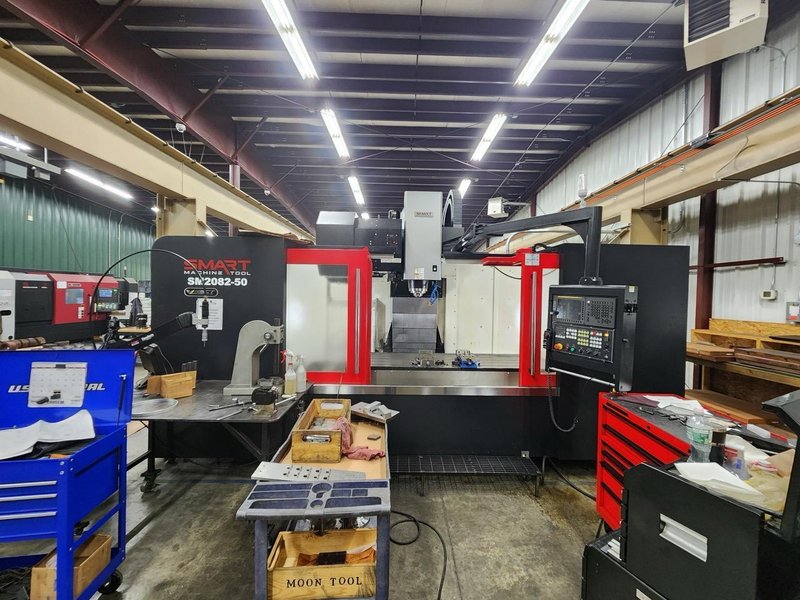Smart SM2082-50 VMC, 2024 – 6K RPM Gear Driven Spindle, Box Ways, TSC, Chip Conveyor
