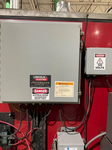 LINCOLN ELECTRIC SYSTEM 10 MIG CELL FANUC ROBOT