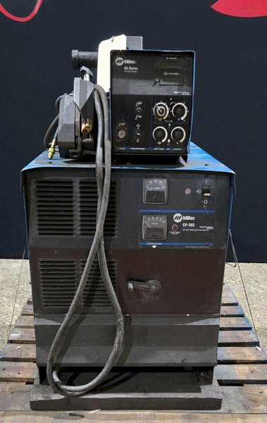 MILLER CP-302 MIG WELDER WITH 60 SERIES 24V WIRE FEEDER USED