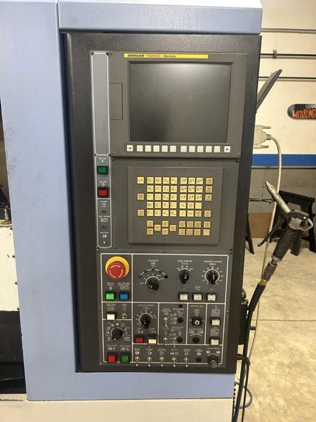 Doosan DNM 500 VMC, 2009 – 4th Axis Wired, Fanuc Control
