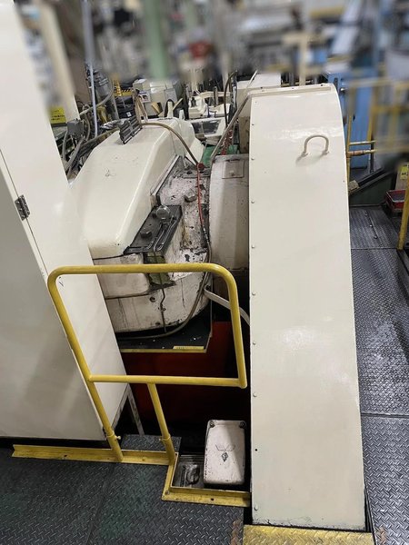 National Model 750 High Speed Double Stroke Roller Header