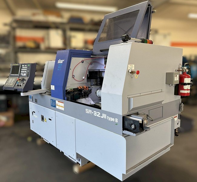 STAR SR-32JII Type B Swiss CNC Lathe 2019 w/ Turning Tool with 6 Stations, Back Side facing Operator 5 Stations Live, Back Side Sub Spindle Tools 8 Stations (4 /4 stacked on top of each other all live) (The Y Axis), Parts Conveyor, LNS Alpha 538 Magazine Bar Loader, Fire Suppression System. Ran oil.